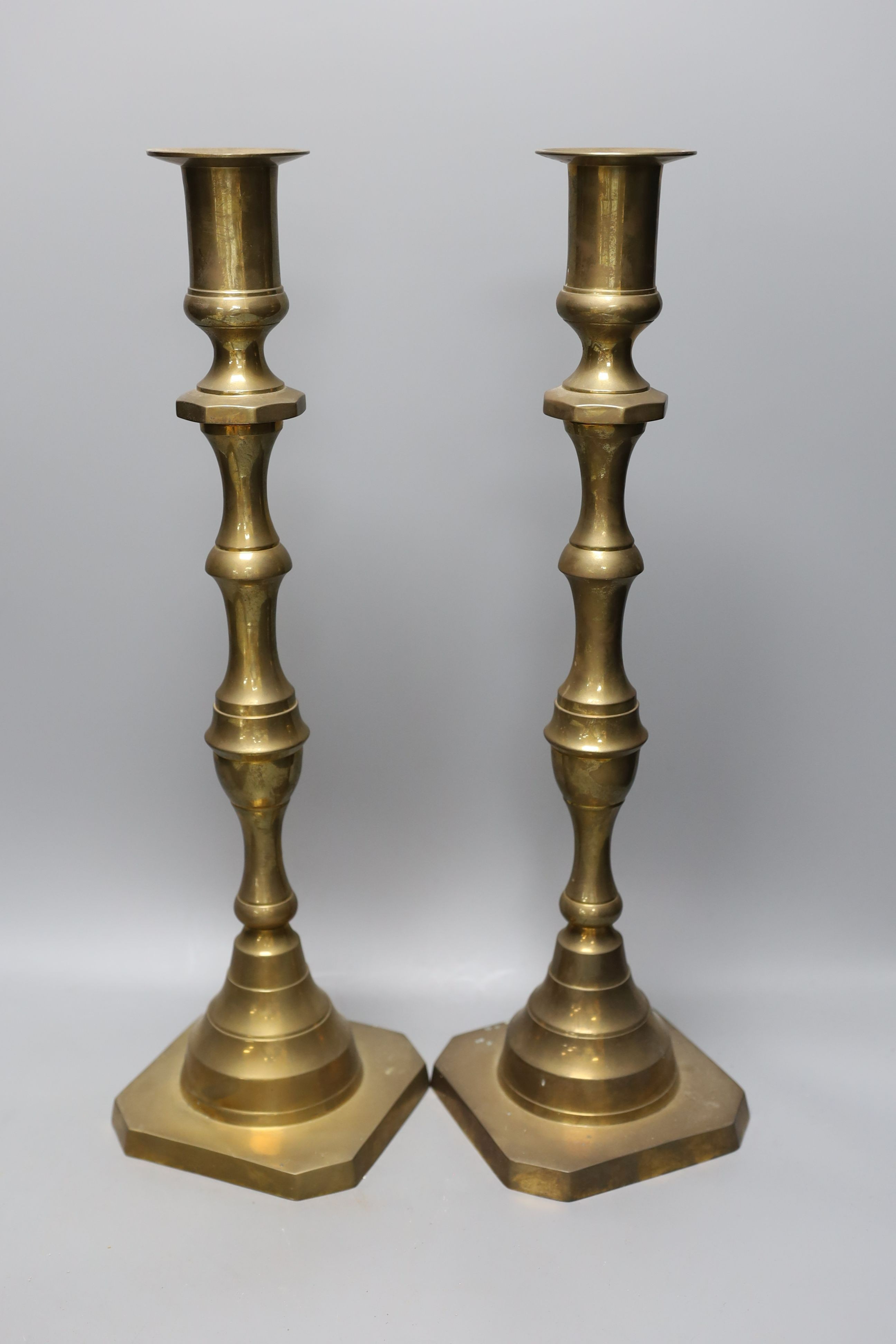 A Damascus jewellery casket and a pair of Victorian candlesticks, 43cm tall